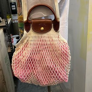 Longchamp mesh shoulder bag with leather trim.